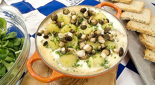 Coliflor con salsa de jamón y queso